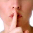 hush secret finger on lips
